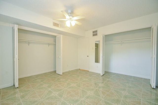 unfurnished bedroom featuring ceiling fan