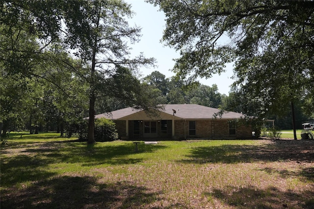 exterior space featuring a front lawn