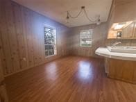 interior space featuring plenty of natural light and hardwood / wood-style floors