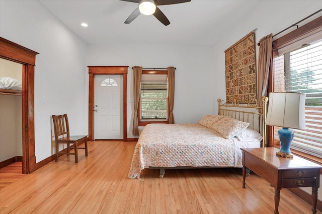 bedroom featuring ceiling fan and light hardwood / wood-style flooring