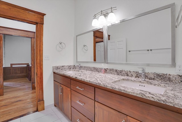 bathroom featuring tile patterned floors and vanity