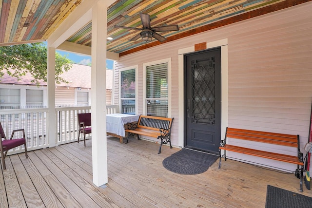 wooden terrace with ceiling fan