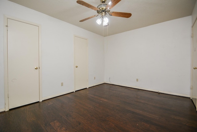 unfurnished bedroom with wood finished floors and a ceiling fan