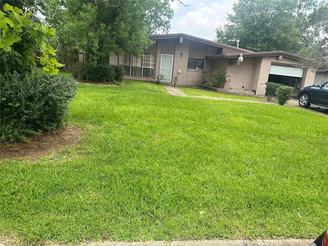 view of yard with a garage