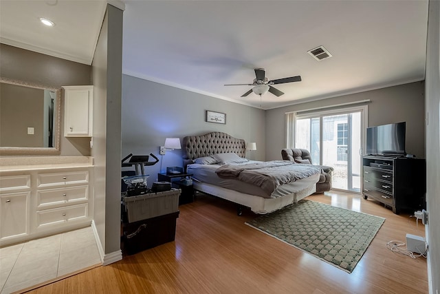 bedroom featuring light hardwood / wood-style floors, ceiling fan, crown molding, and access to outside