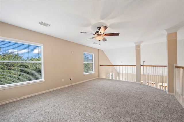 carpeted empty room featuring ceiling fan