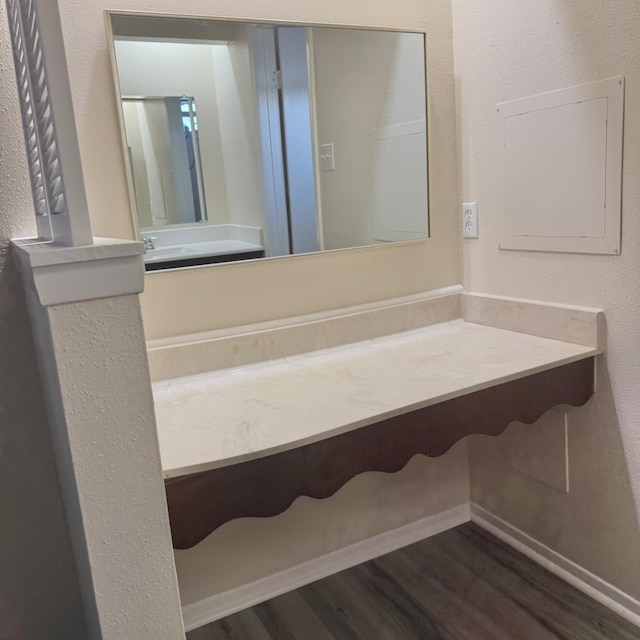 bathroom featuring vanity and hardwood / wood-style flooring