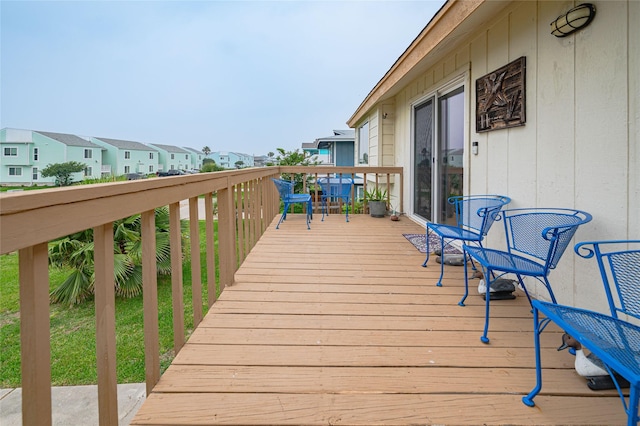 11 Lauderdale, Rockport, TX 78382 - wooden deck featuring a residential view