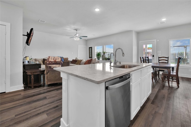 kitchen with sink, a kitchen island with sink, white cabinets, dark hardwood / wood-style flooring, and stainless steel dishwasher