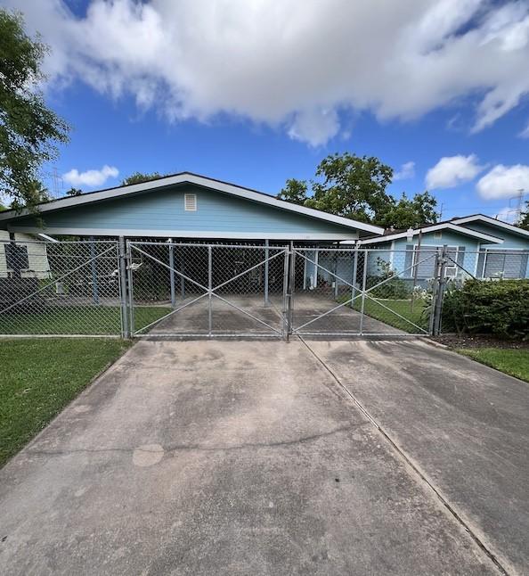 exterior space featuring a carport