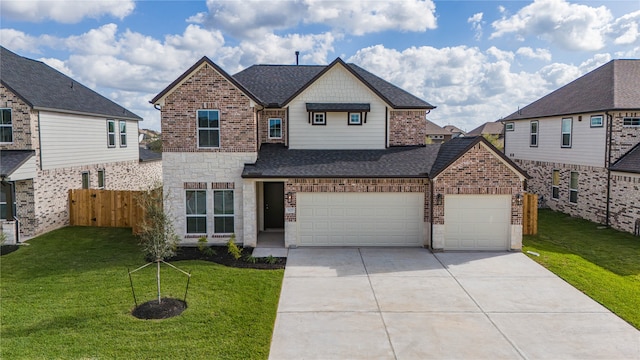 front of property with a front yard and a garage