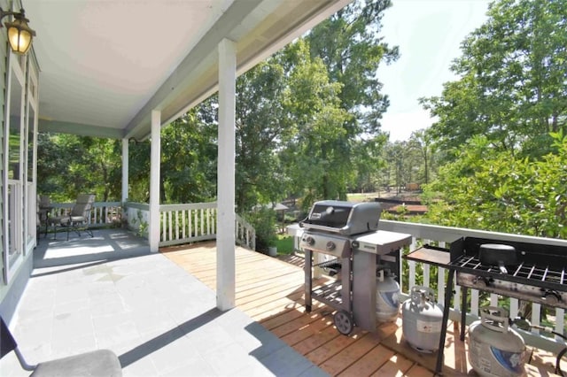 wooden deck with grilling area