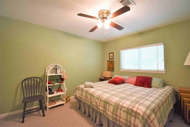 bedroom featuring ceiling fan and carpet flooring