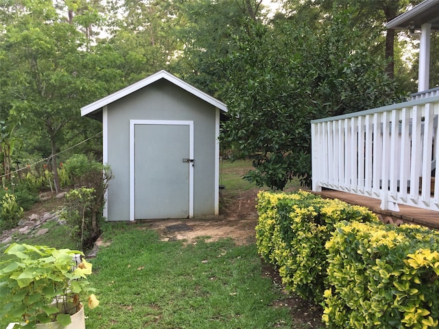 view of outdoor structure with a yard