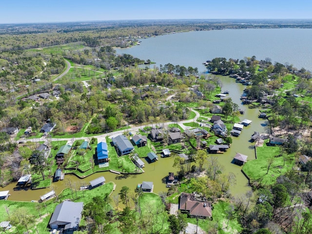 birds eye view of property with a residential view and a water view