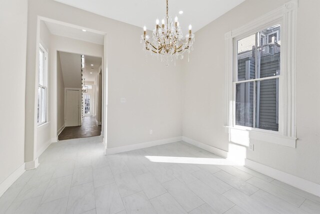 empty room with a chandelier