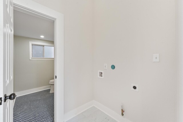 clothes washing area with electric dryer hookup, hookup for a gas dryer, and hookup for a washing machine