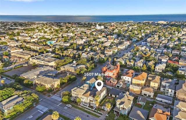 aerial view with a water view and a residential view