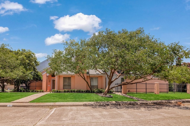 view of front of property with a front lawn