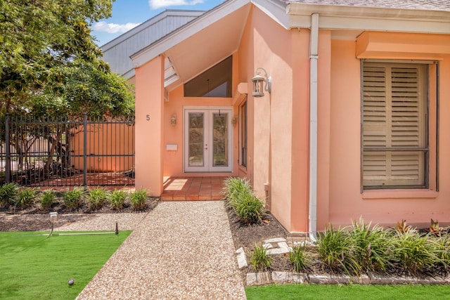 doorway to property featuring french doors