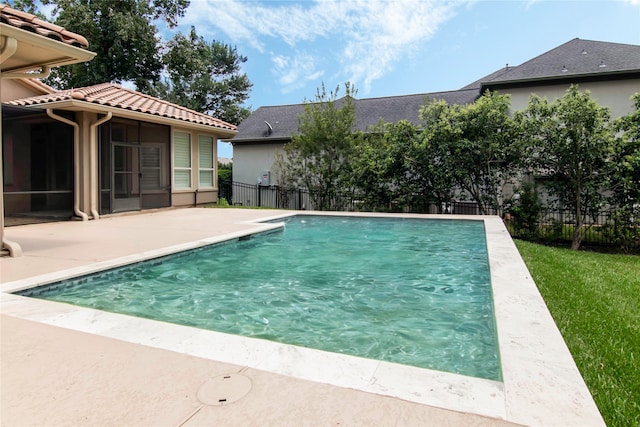 view of swimming pool featuring a patio