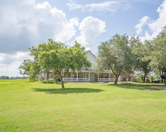 view of yard with a porch