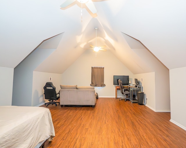 bedroom with lofted ceiling, ceiling fan, and hardwood / wood-style floors