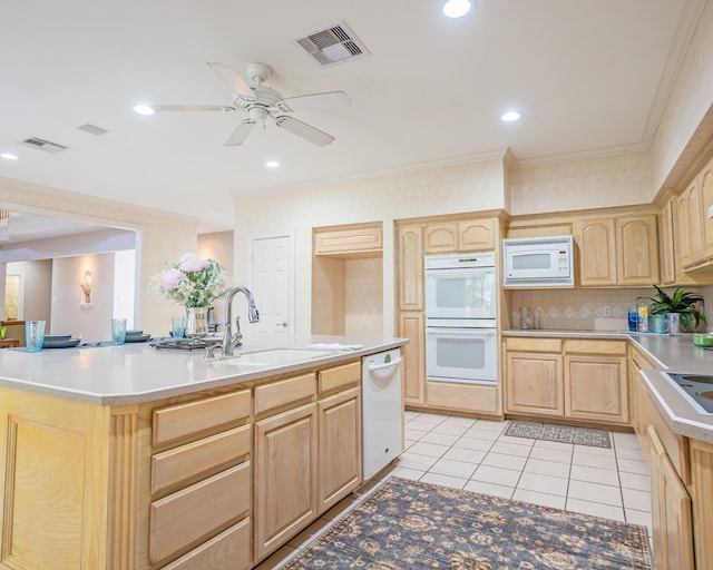 kitchen with tasteful backsplash, light brown cabinets, white appliances, light tile patterned floors, and ceiling fan