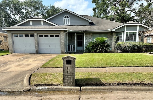 ranch-style home featuring a garage and a front lawn