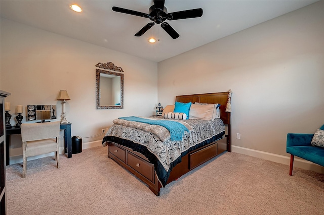 bedroom featuring light colored carpet and ceiling fan