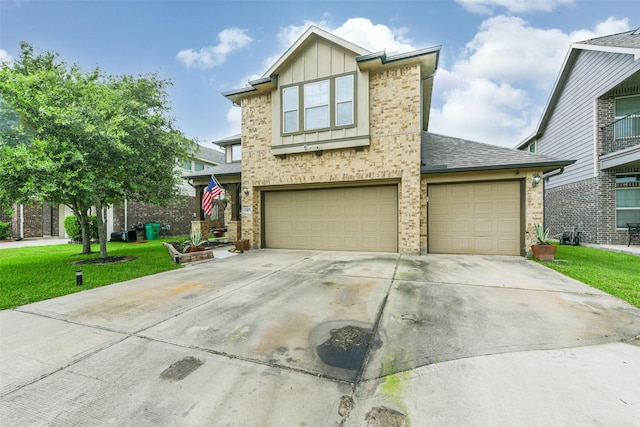 view of front facade featuring a front lawn and a garage