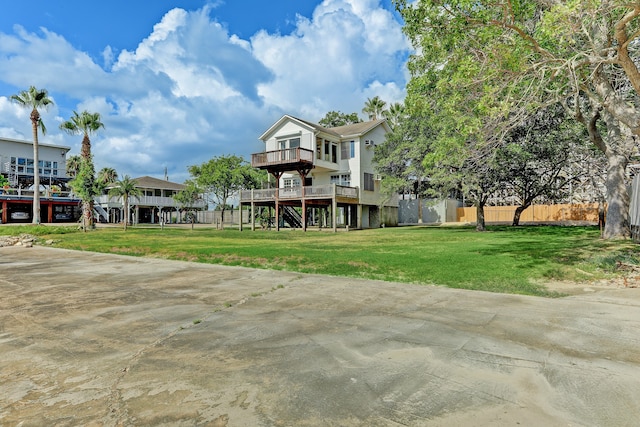 view of yard featuring a wooden deck