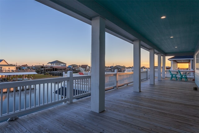 1295 Lagoon Dr, Crystal Beach, TX 77650 - wooden deck with a water view
