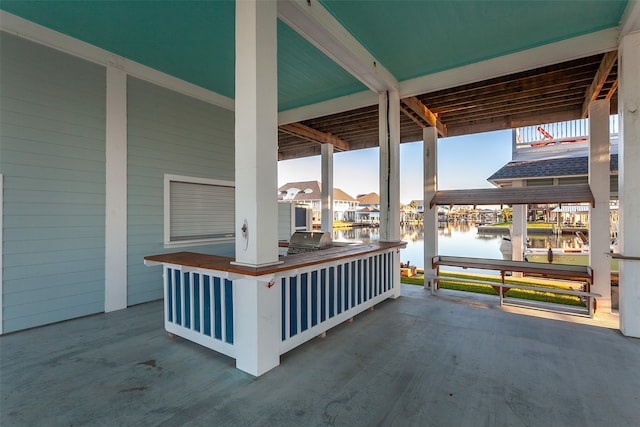 view of patio / terrace featuring a water view