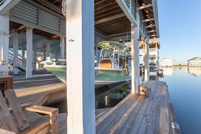 dock area featuring a water view