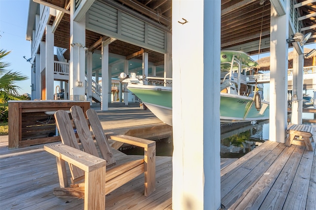 wooden terrace with a dock