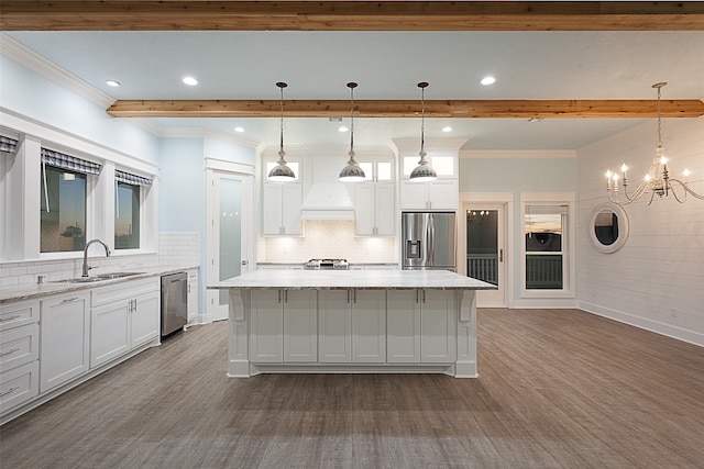 1295 Lagoon Dr, Crystal Beach, TX 77650 - kitchen featuring stainless steel appliances, dark wood-type flooring, white cabinetry, beamed ceiling, and a kitchen island