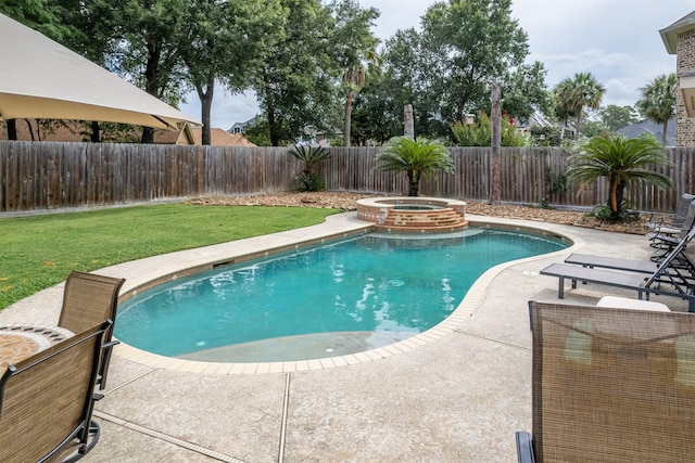 view of pool with a lawn, an in ground hot tub, and a patio