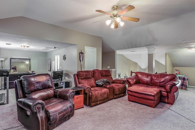 carpeted living room with a textured ceiling, ceiling fan, and lofted ceiling