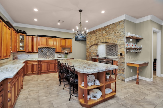 kitchen featuring brown cabinetry, a kitchen island, glass insert cabinets, high end range, and open shelves