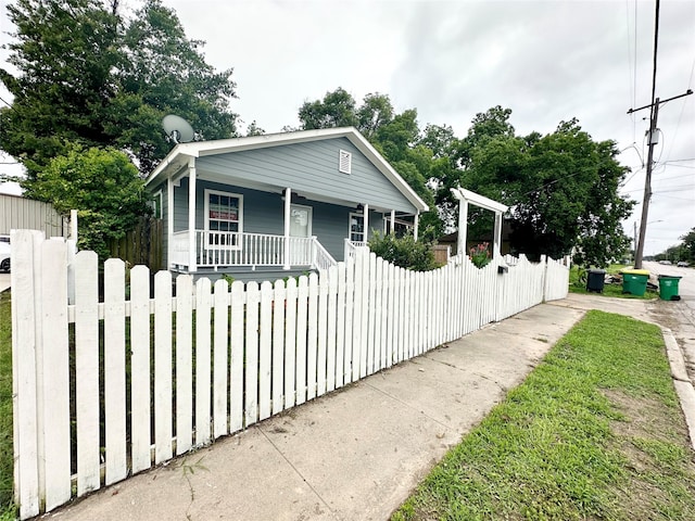 view of home's exterior featuring a porch