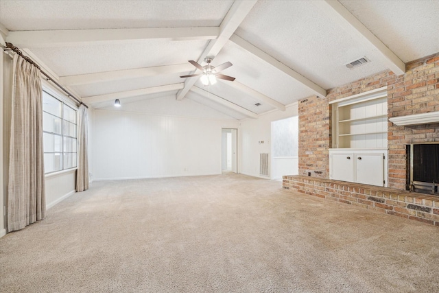 unfurnished living room featuring a textured ceiling, ceiling fan, lofted ceiling with beams, and light carpet