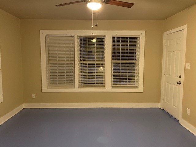 spare room featuring ceiling fan