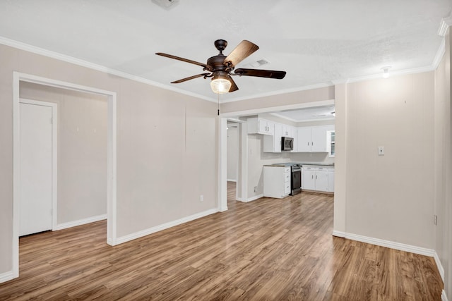 unfurnished living room with crown molding, ceiling fan, and light wood-type flooring