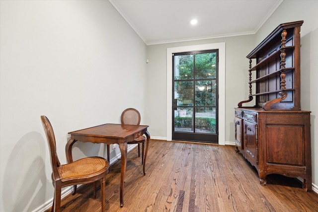 interior space featuring ornamental molding and wood-type flooring