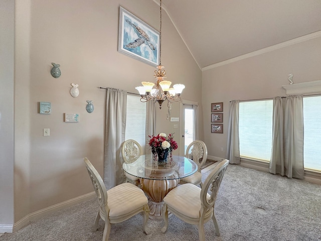 dining area featuring high vaulted ceiling, a chandelier, crown molding, and carpet flooring