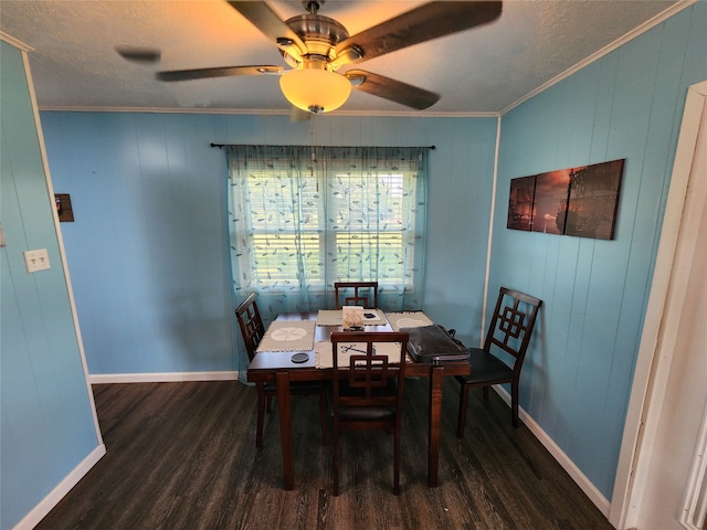 dining space with ornamental molding, ceiling fan, and hardwood / wood-style floors