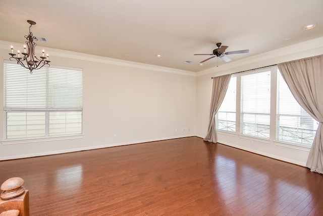 unfurnished room featuring crown molding, dark wood-type flooring, and ceiling fan with notable chandelier