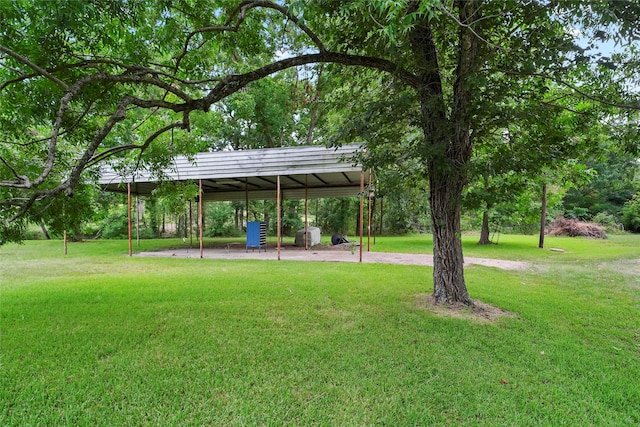 view of property's community with a yard