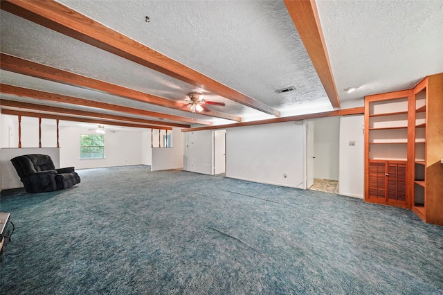 unfurnished living room with a textured ceiling, ceiling fan, and carpet flooring